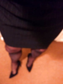 Unshaven Legs,  Black Tights,  Skirt And Heels...  Not Sure If