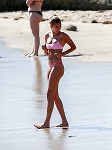 Hailey Baldwin Wearing A Tiny Pink Bikini