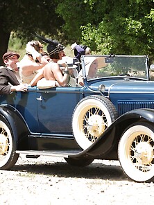 Good Looking Babes Driving In An Old Car By The Lake