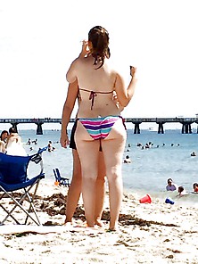 Teen On A Beach With Her Mom