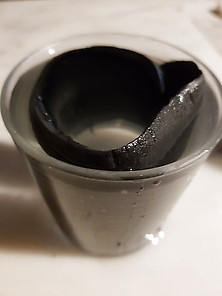 Making Tea With Insole Of Black Sneaker Of Young Girl