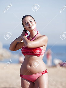 In A Pink Swimsuit At Sea