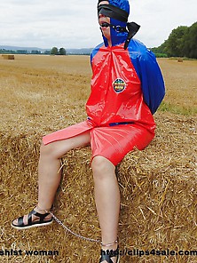 Handcuffed In Shiny Raincoat