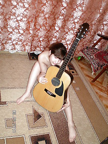 Cute Girl With A Guitar